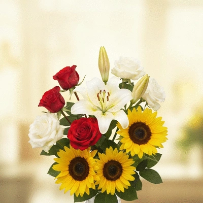 Beautifully arranged bouquet of various flowers like roses, lilies, and sunflowers, with soft lighting and a blurred background, no text, no words, no typography, no labels, clean image